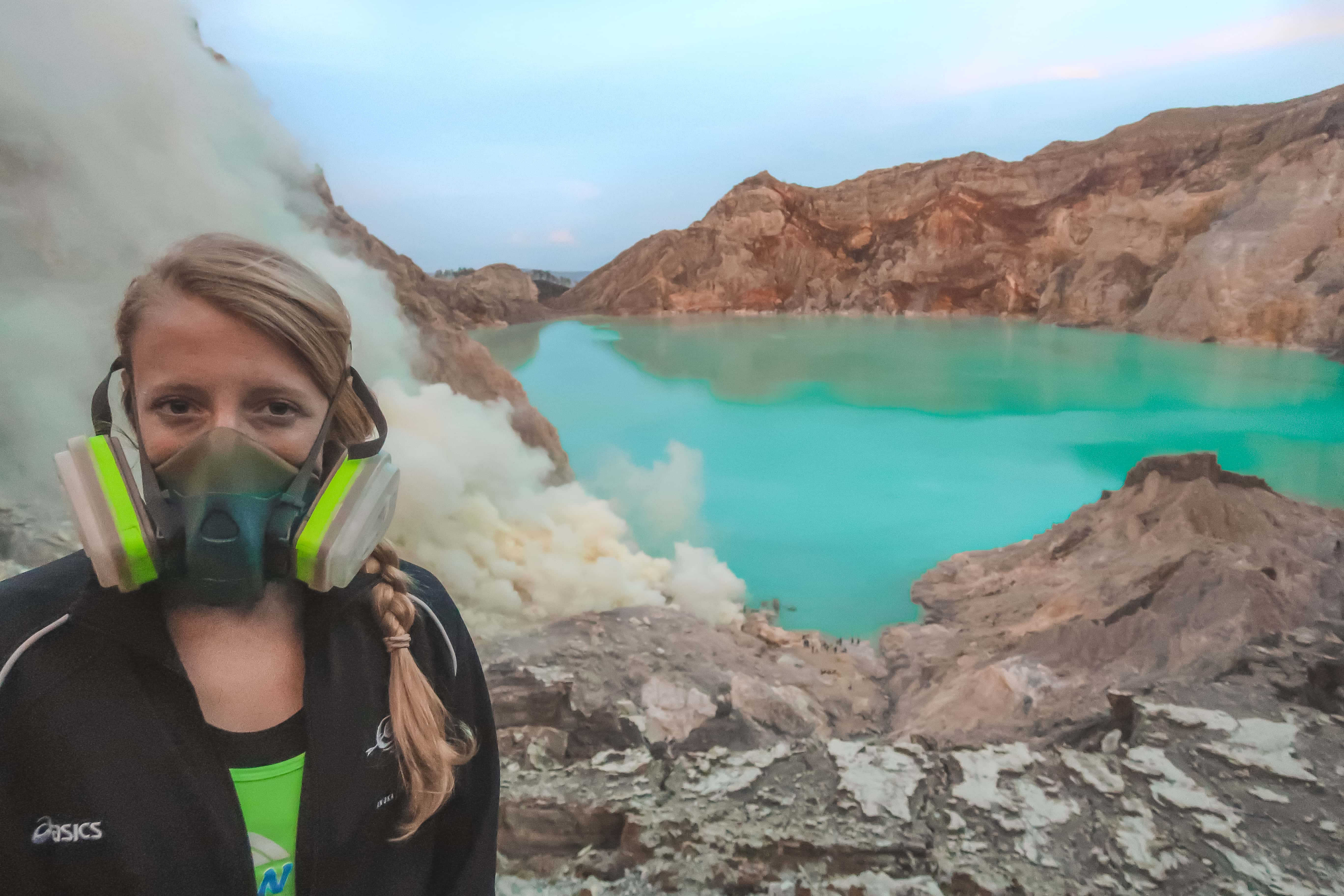 Laura standing next to the acidic lake during the Mt Ijen hike. 