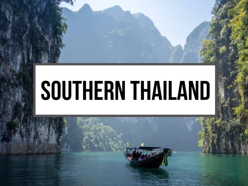 Limestone Cliffs in Southern Thailand With Long Tail Boat