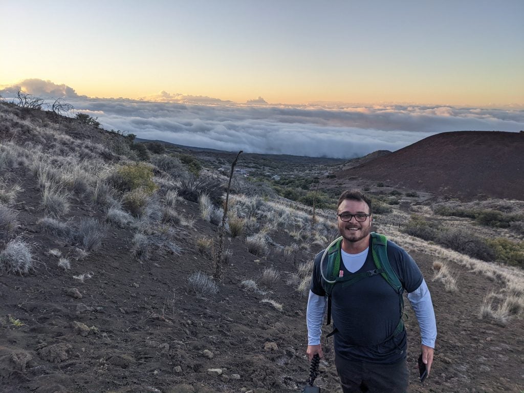 Mike at the Trailhead of Mauna Kea at Sunrise. This is One of The Best Things To Do In Hilo, Hawaii.