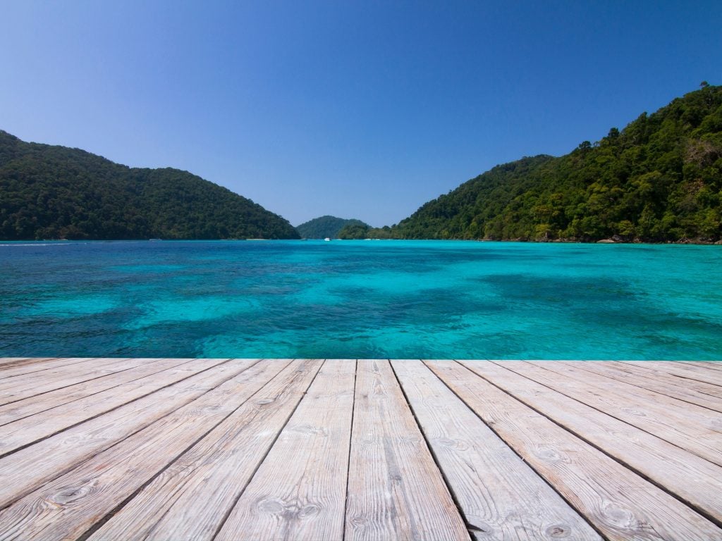 Koh Surin Nuea Island View of the Ocean From A Dock.