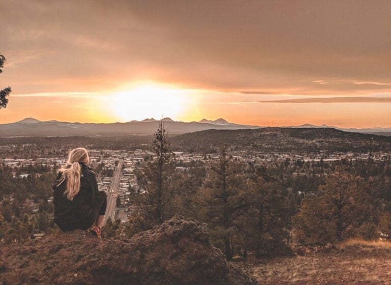 Sitting on the Edge of Pilot Butte in Bend, Oregon.