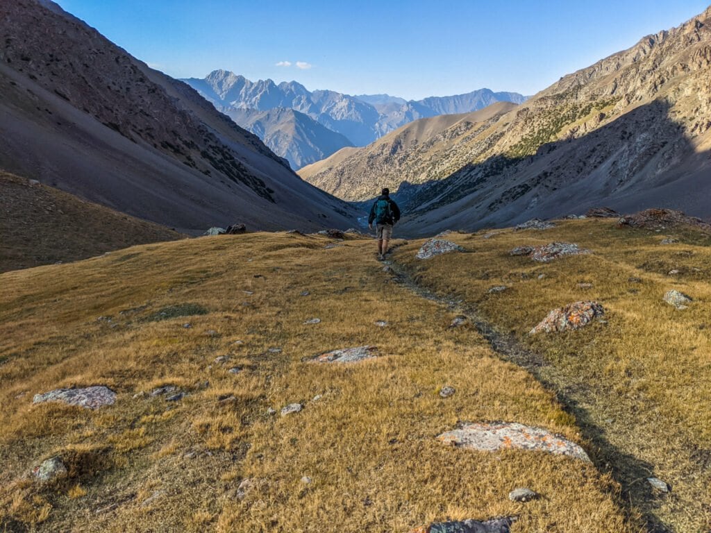 Walking Down Into The Valley In Kyrgyzstan.