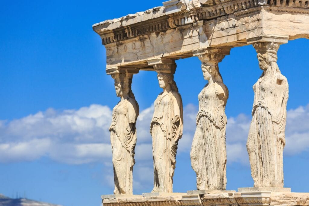 There are a few old dialects in the Greek language, but most people speak modern-day Greek or English.