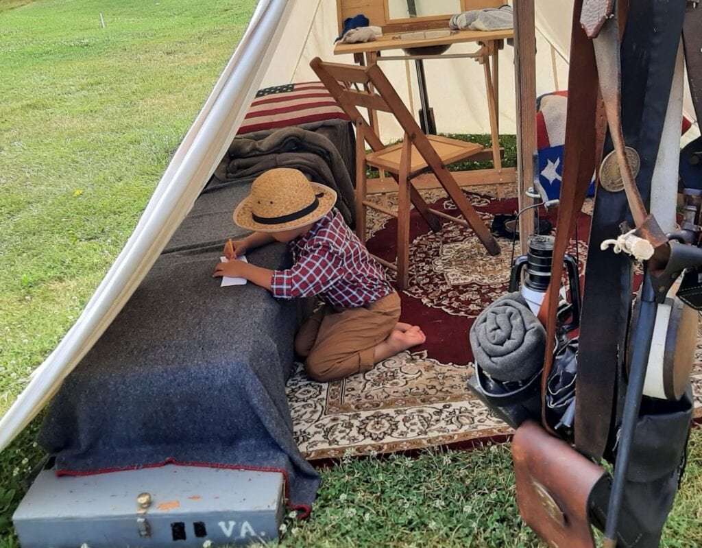 Child reenactor at the annual Battle of Gettysburg Reenactment, one of the top Pennsylvania famous landmarks.