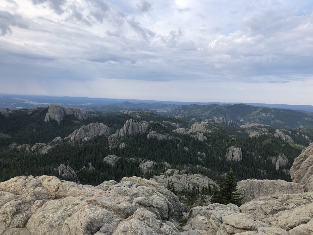The view from Black Elk Peak, an intermediate hiking trail in Black Hills, South Dakota.
