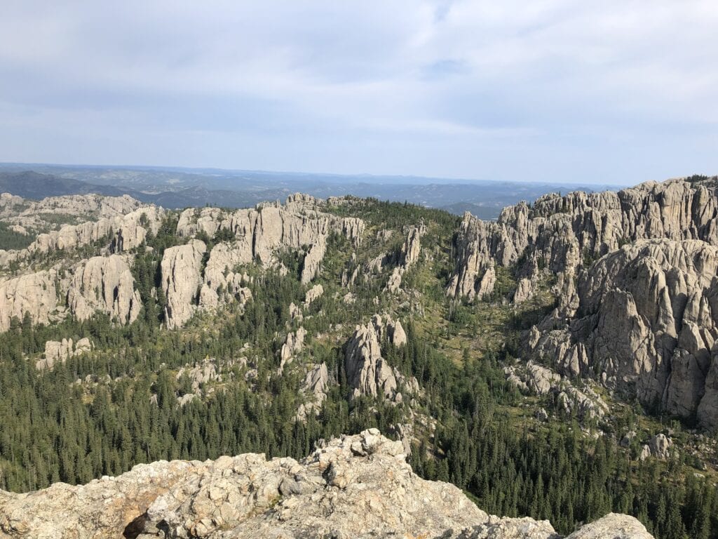 Distant view of the spires rock formations that Black Hills hiking trails are known for.