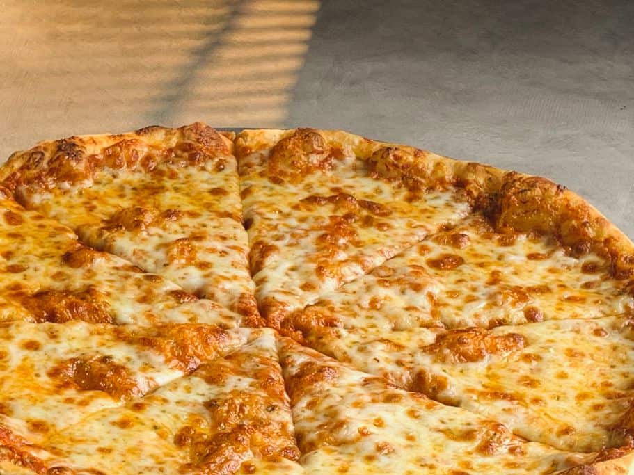 Lucy's restaurant by the river in Idaho Falls has amazing New York Style pizza like this.
