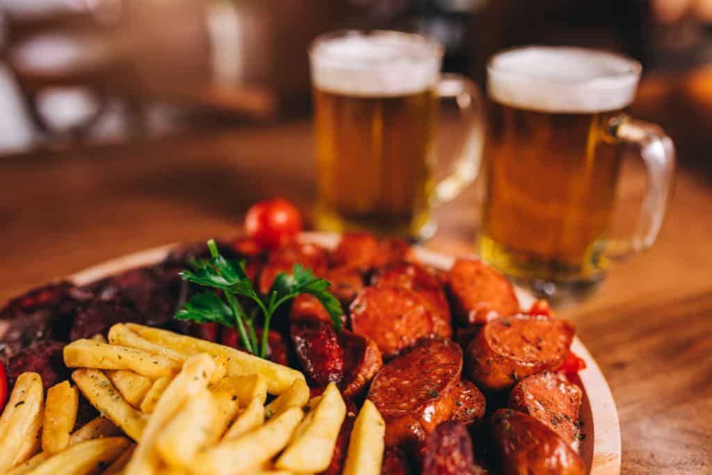 Get mouth-watering Irish pub food like these fries, sausage and beer at Idaho Fall's Irish Restaurant, The Celt Bar & Grill.