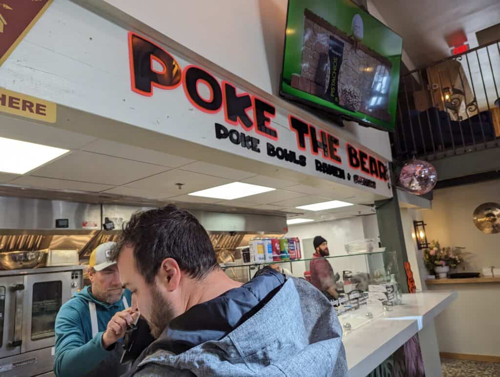 Mike ordering a Poke Bowl from Poke The Bear in downtown Steamboat.