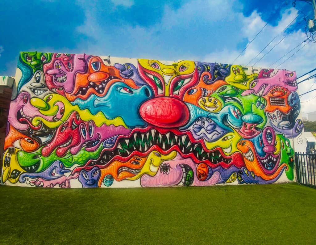 A bright and vibrant mural at Wynwood Walls in Miami.