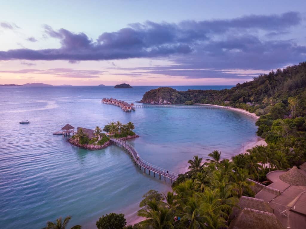 Likuliku Fiji Overwater Bungalows Aerial View at Sunset
