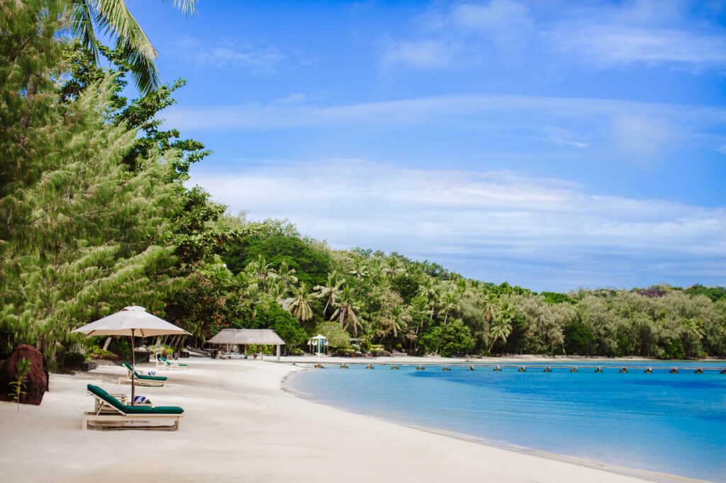 Beachside chairs on Honeymoon Beach on Turtle Island