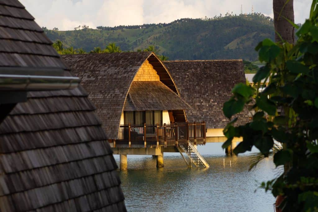 Overwater bungalow in Momi Bay Fiji at dusk