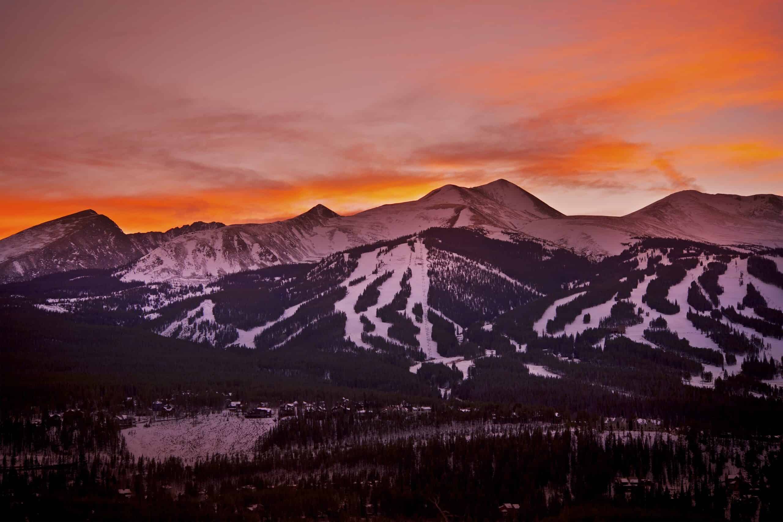 Sunset skies over the snowy mountains of Breckenridge, Colorado.