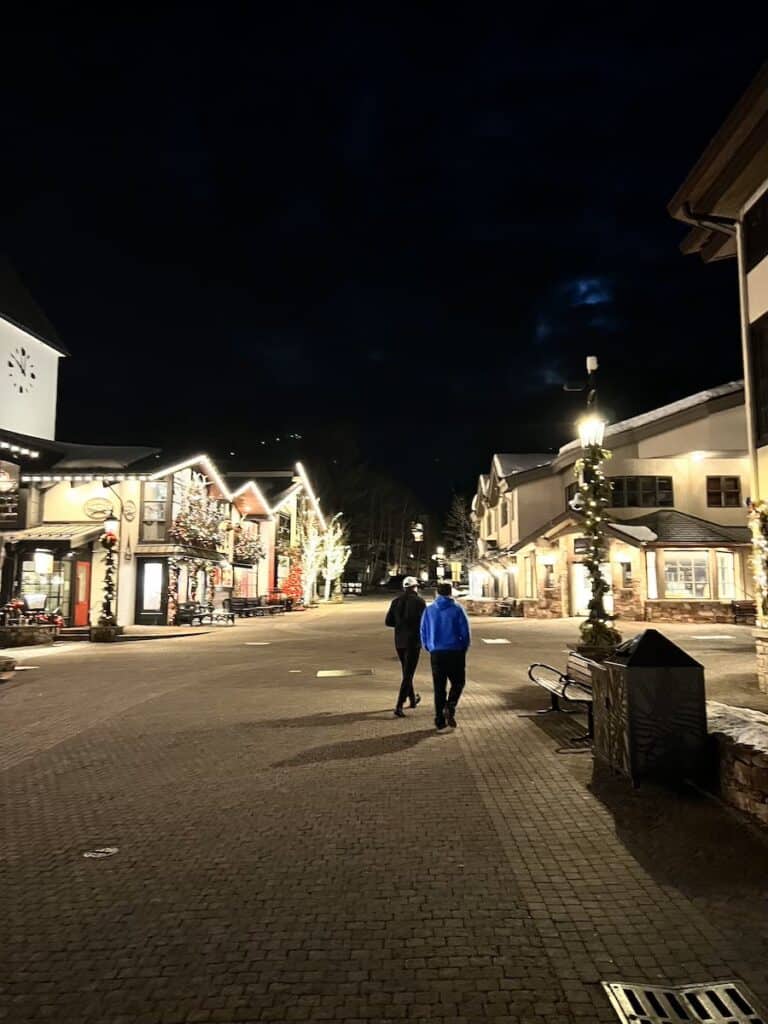 Walking around Vail Village lit up at night with glowing lights is one of the best things to do in Vail in winter.