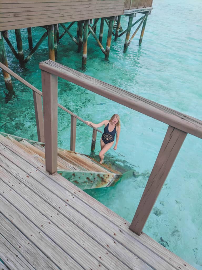 Laura walking up the steps to our overwater bungalow in the Maldives