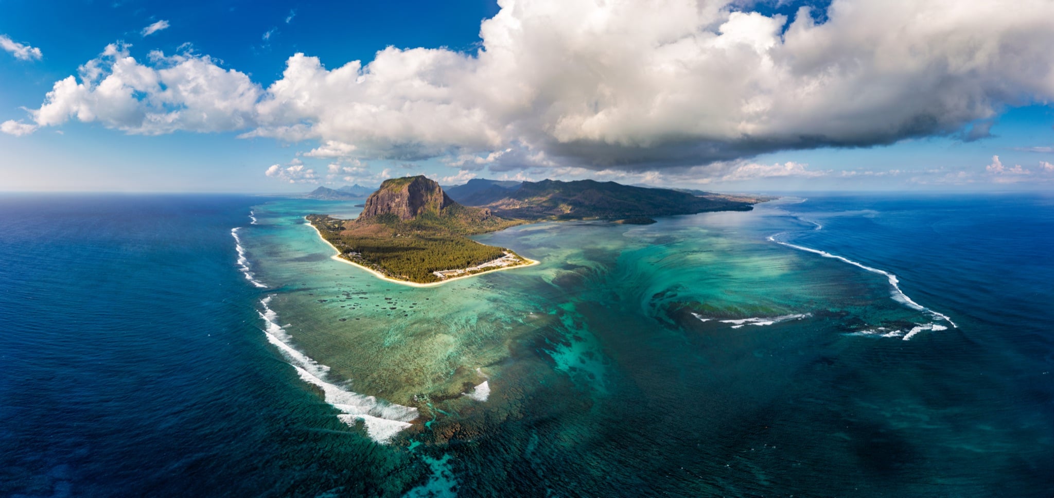 Aerial view of the underwater waterfall illusion off Le Morne, Mauritius